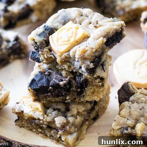 Soft and chewy Girl Guide Cookie Bars, studded with your favorite chocolate and vanilla Girl Guide cookies.