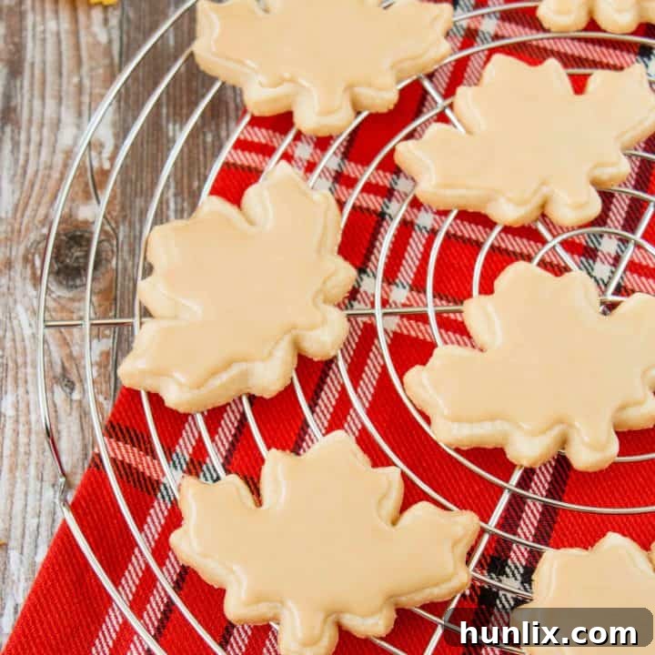 Melt-in-your-mouth Glazed Maple Shortbread Cookies with a rich buttery taste and bold maple finish.