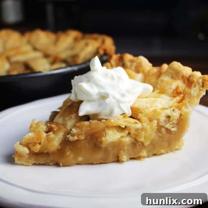 Classic Quebec Sugar Pie with a smooth, rich, creamy filling made with brown sugar and maple syrup, a traditional French Canadian dessert.