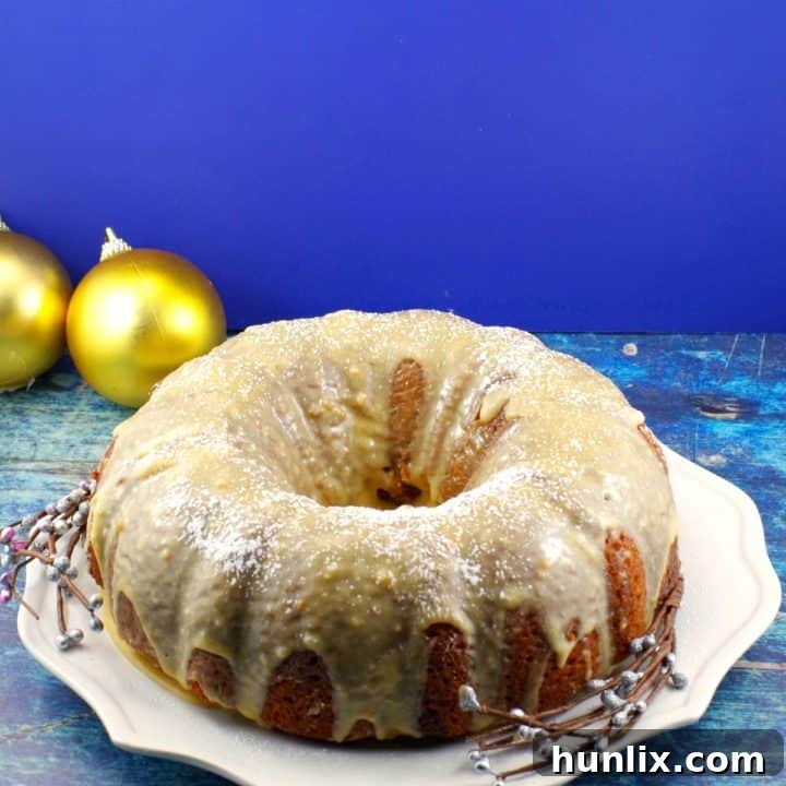 A Butter Tart Bundt Cake with swirl filling and brown butter maple glaze, a cake version of the classic tart.