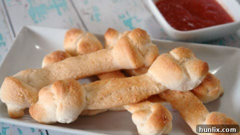 Fun and easy breadstick bones appetizer for Halloween.