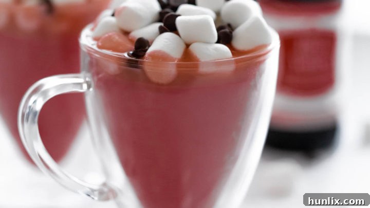 Delicious Crockpot Red Velvet Hot Chocolate, easily made in a slow cooker for a warm and comforting treat.