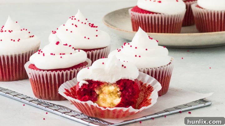 Simple and fun Red Velvet Cheesecake Cupcakes with a baked-in cheesecake filling, a delightful twist on classic red velvet.