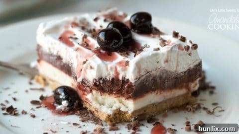 A stunning no-bake, 4-layered Red Velvet Lasagna dessert, truly a show stopper for any gathering.