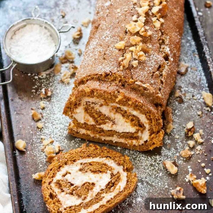 Spiced Gingerbread Roll Cake with Eggnog Cream Cheese Filling