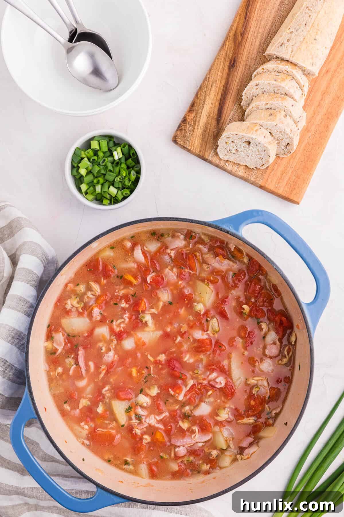 Manhattan Tomato Clam Chowder 2 Manhattan clam chowder in a dutch oven.