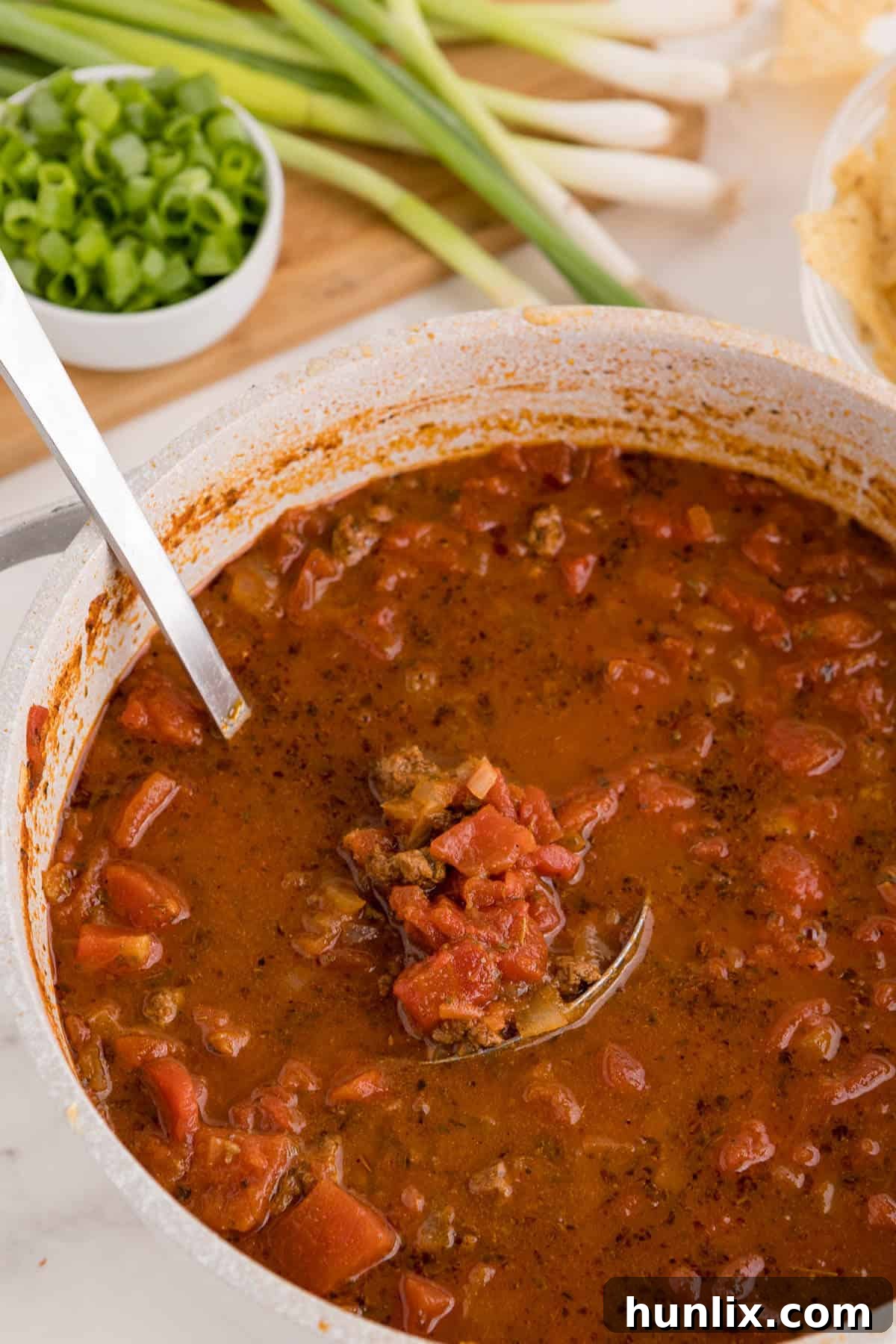 Taco soup simmering in a large pot, ready to be served.