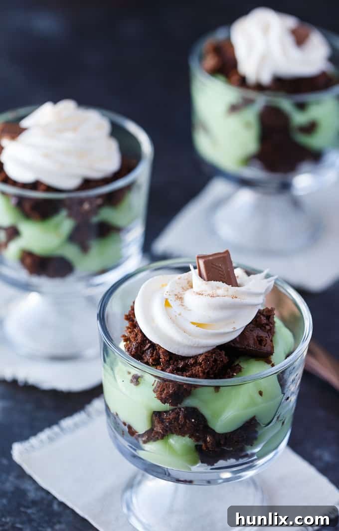 Close-up of a St. Patrick's Day Truffle showing layers of brownie and green pudding, ready to be topped.