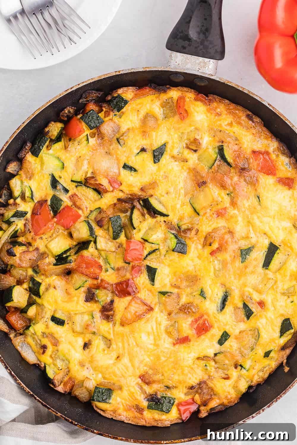 Sweet Caramelized Onion, Red Pepper and Zucchini Frittata 3 Caramelized Onion, Red Pepper & Zucchini Frittata - Loaded with red pepper and zucchini, this veggie-packed dish is healthy and filling - and low carb too!