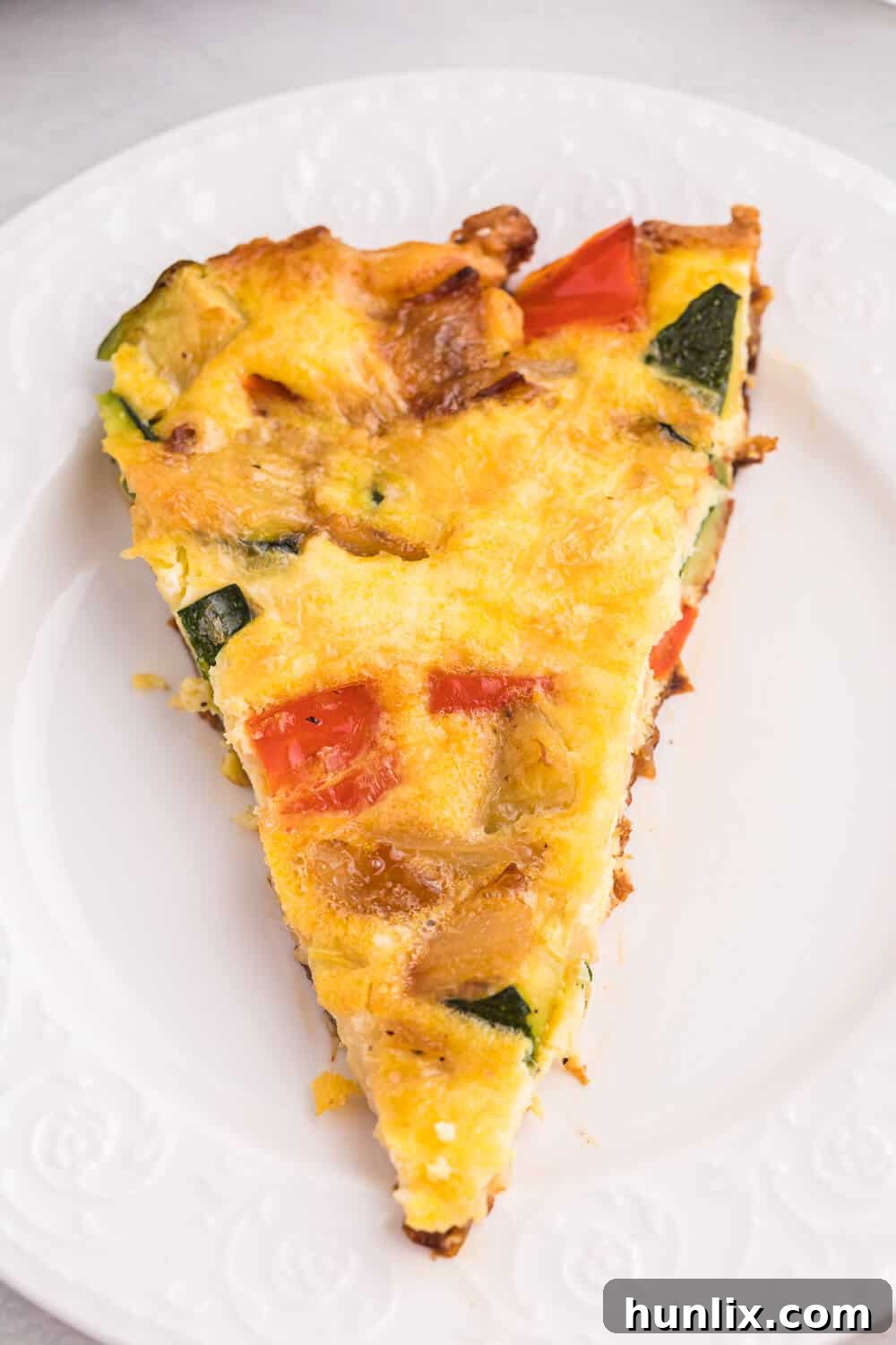 Sweet Caramelized Onion, Red Pepper and Zucchini Frittata 6 Caramelized Onion, Red Pepper & Zucchini Frittata - Loaded with red pepper and zucchini, this veggie-packed dish is healthy and filling - and low carb too!