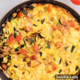Sweet Caramelized Onion, Red Pepper and Zucchini Frittata 7 Caramelized Onion, Red Pepper & Zucchini Frittata - Loaded with red pepper and zucchini, this veggie-packed dish is healthy and filling - and low carb too!