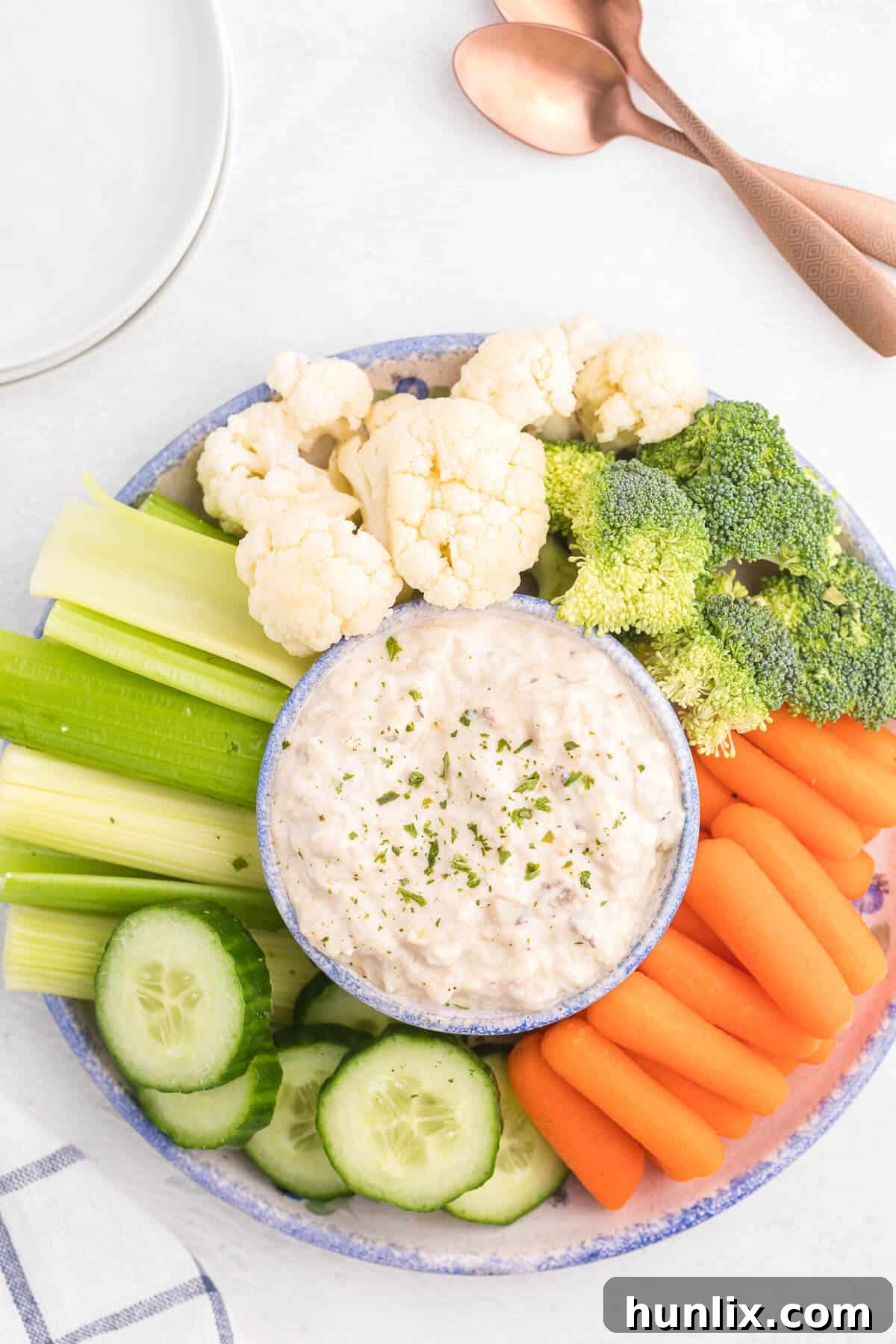 Grilled Eggplant Dip Recipe - An easy and healthy appetizer perfect for parties! Eggplant is grilled to perfection and added to a creamy lemon garlic yogurt based dip. Serve with fresh veggies or crackers.