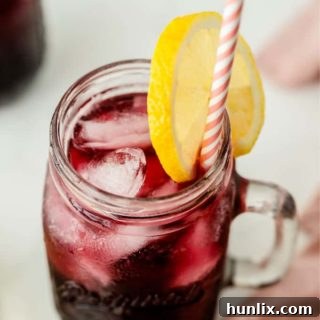 Sparkling Grape Lemonade in a glass mug.