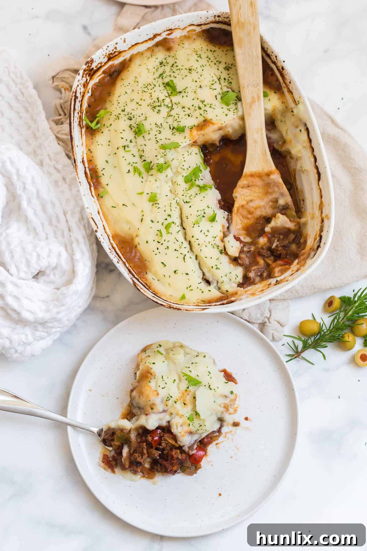 A close-up of Beef Picadillo Shepherd's Pie, showing the intricate layers and inviting texture.