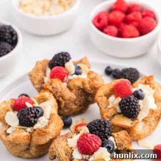 French Toast Cups - This easy breakfast recipe is the perfect sweet start to your day. Creamy ricotta with fresh berries and a drizzle of honey or maple syrup are a delicious breakfast treat.