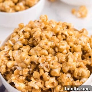 A white bowl of the caramel marshmallow popcorn recipe.