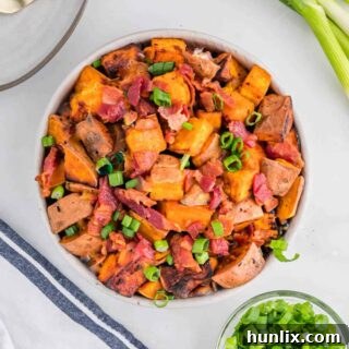 A bowl of sweet potato home fries.