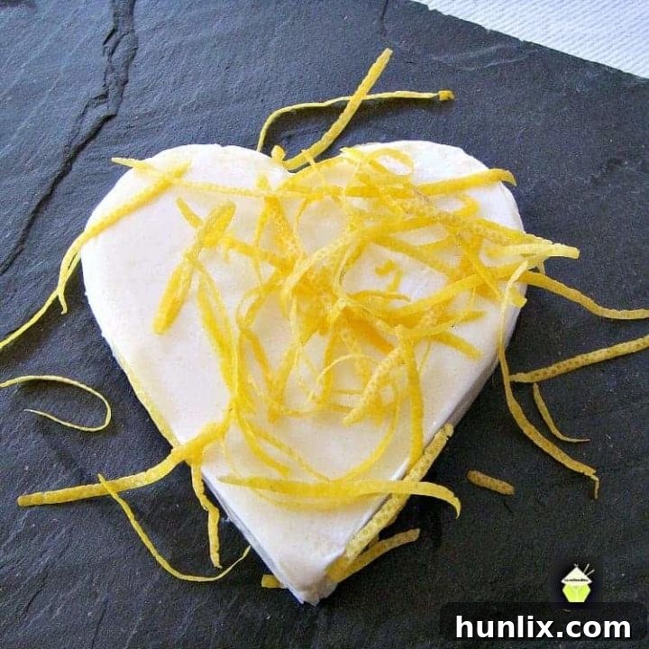 Smooth Pear and Lemon Panna Cotta with Raspberry Sauce, a refreshing and easy dessert for Valentine's Day.