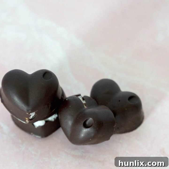 Rich and dreamy Chocolate Coconut Butter Cups, covered in dark chocolate, ready in minutes for Valentine's Day.