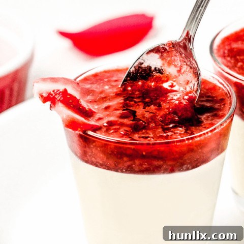 Romantic Strawberry Panna Cotta, a simple vanilla bean panna cotta with sweet strawberry coulis.