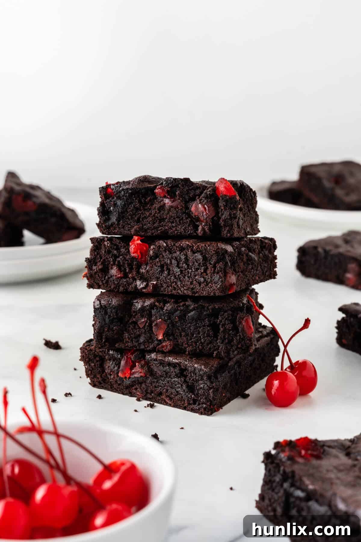 Black Forest Cherry Brownies 11 A perfectly stacked pile of cherry chocolate brownies.