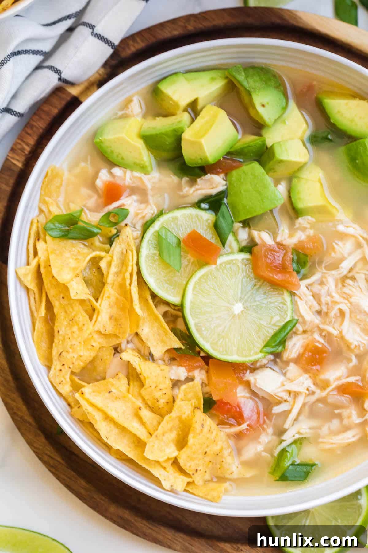 A bowl of Chicken and Lime Soup, ready to be enjoyed.