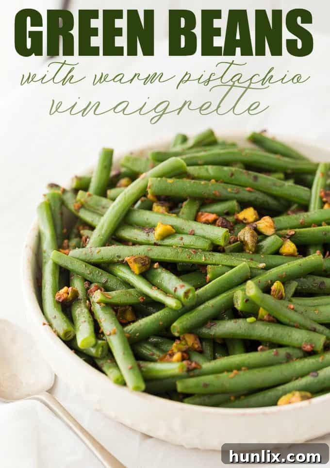Vibrant Green Beans with Warm Pistachio Vinaigrette 3 Green Beans with Warm Pistachio Vinaigrette - This recipe is as easy as it is elegant! Make these crispy green beans with a delicious red wine vinaigrette with crushed pistachios for the best holiday side dish ever.