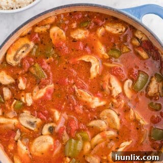 One-Pot Chicken Cacciatore - This is a delicious pantry staple casserole. Made with common ingredients like chicken, green peppers, mushrooms, onions and canned tomatoes, you can throw the ingredients in just one pot - quick to make and quick to clean up!