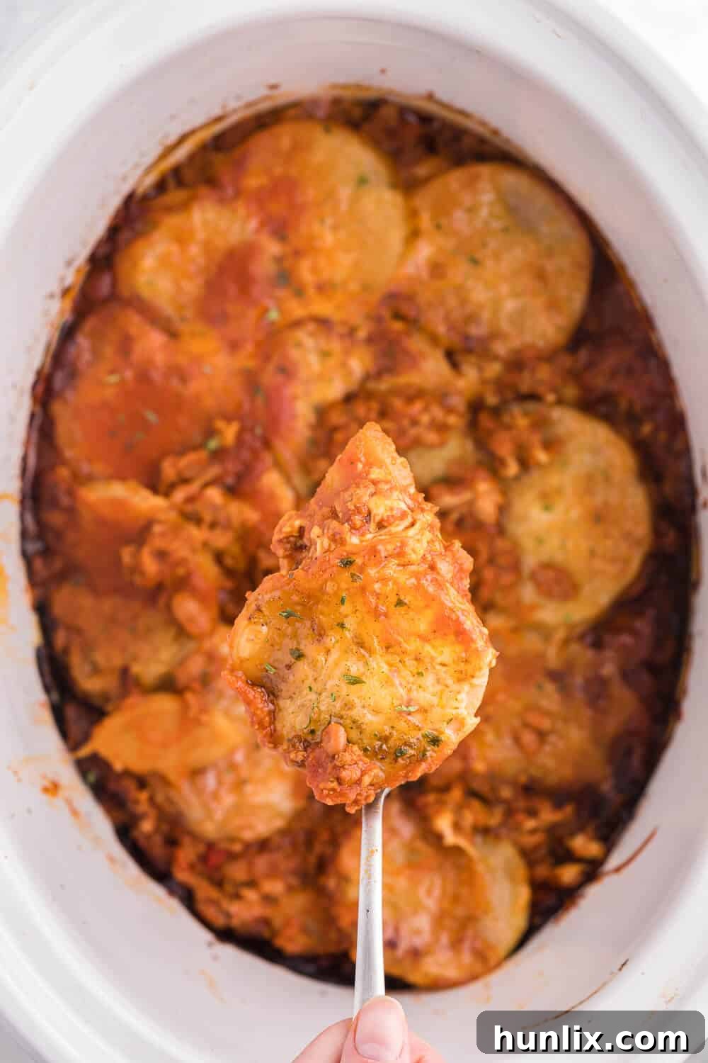 Rustic Ranch Chicken Chili Casserole 3 Close-up of layers in Cowboy Chicken Chili Casserole, showcasing chili, beans, and potatoes