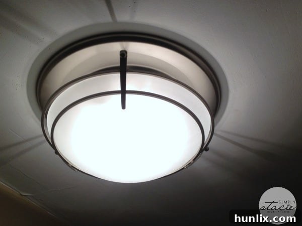 The Upstairs Bathroom Glow-Up 9 Bathroom Lighting Detail - Contemporary Fixtures for Optimal Illumination