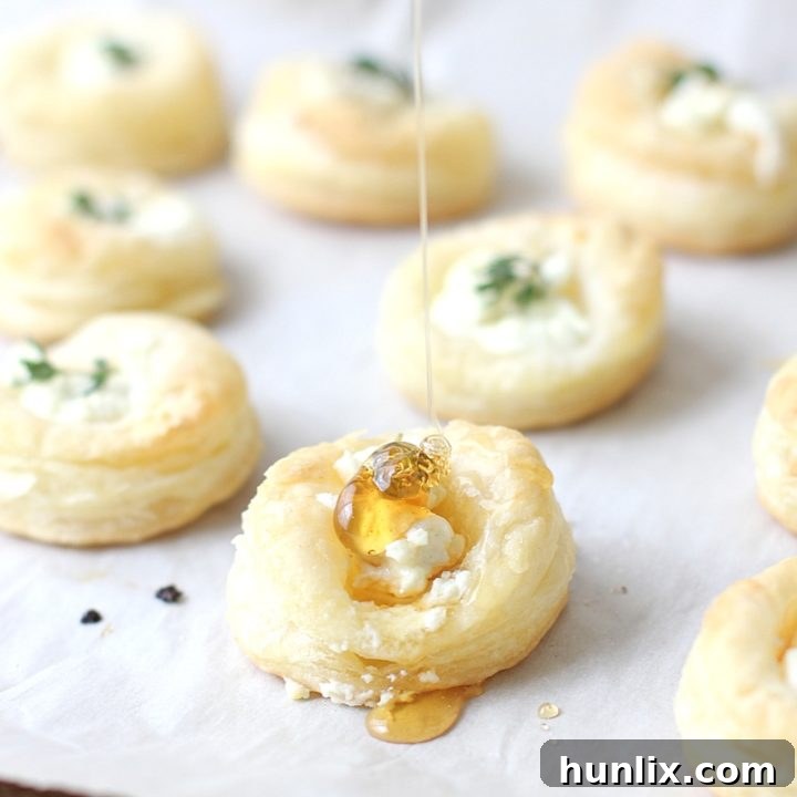 Easy Goat Cheese and Honey Bites - Perfect savory appetizers for gatherings, featuring flaky pastry topped with creamy goat cheese, sweet honey, and fresh thyme for an elegant and easy entertaining idea.