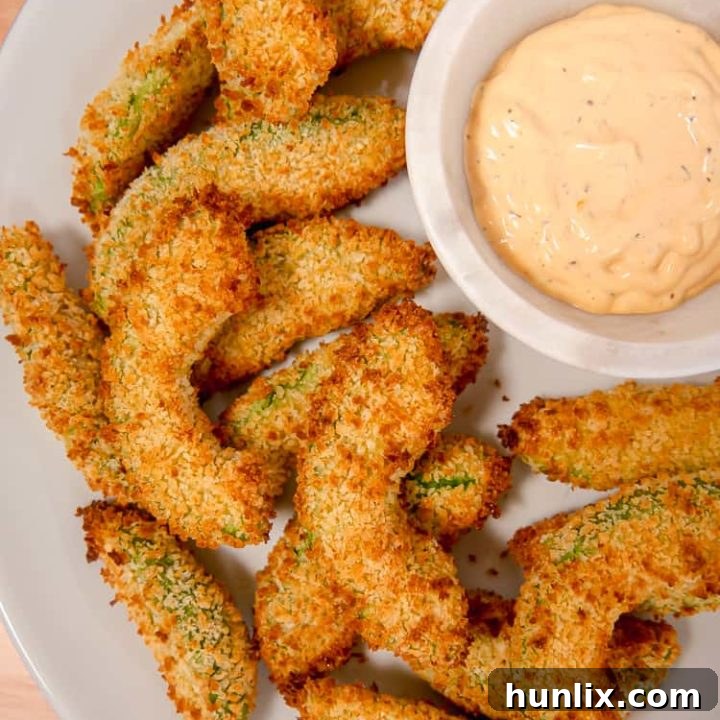 Air Fryer Avocado Fries - Crunchy panko-crusted avocado slices, easy to make in the air fryer or oven. A unique and delicious snack or side dish.