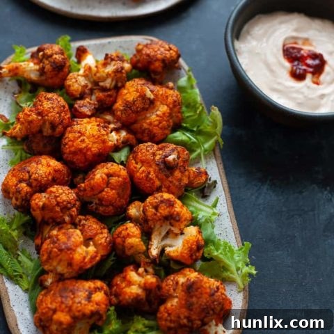 Harissa Cauliflower Wings - Spicy, smoky, and utterly satisfying vegetarian wings that will blow your mind with their flavor.