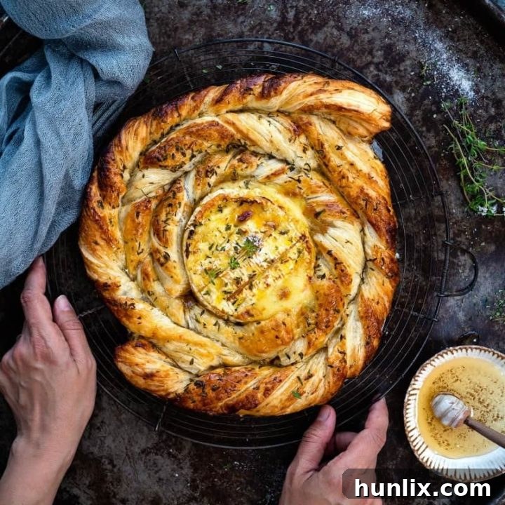 Puff pastry spiral with baked camembert, honey, rosemary and thyme - An amazing, shareable dish requiring minimal ingredients and time. Perfect for entertaining!