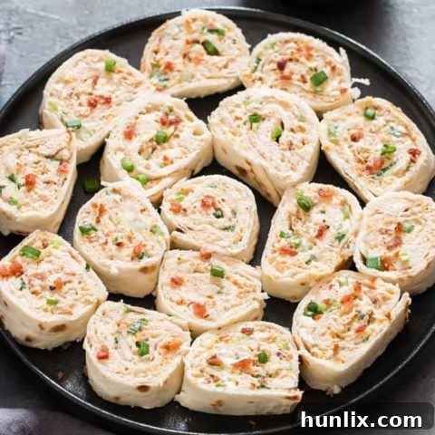 Chicken Enchilada Tortilla Roll-Ups (Pinwheels) - Super easy and fast party appetizers perfect for game day or any gathering, always a crowd pleaser.