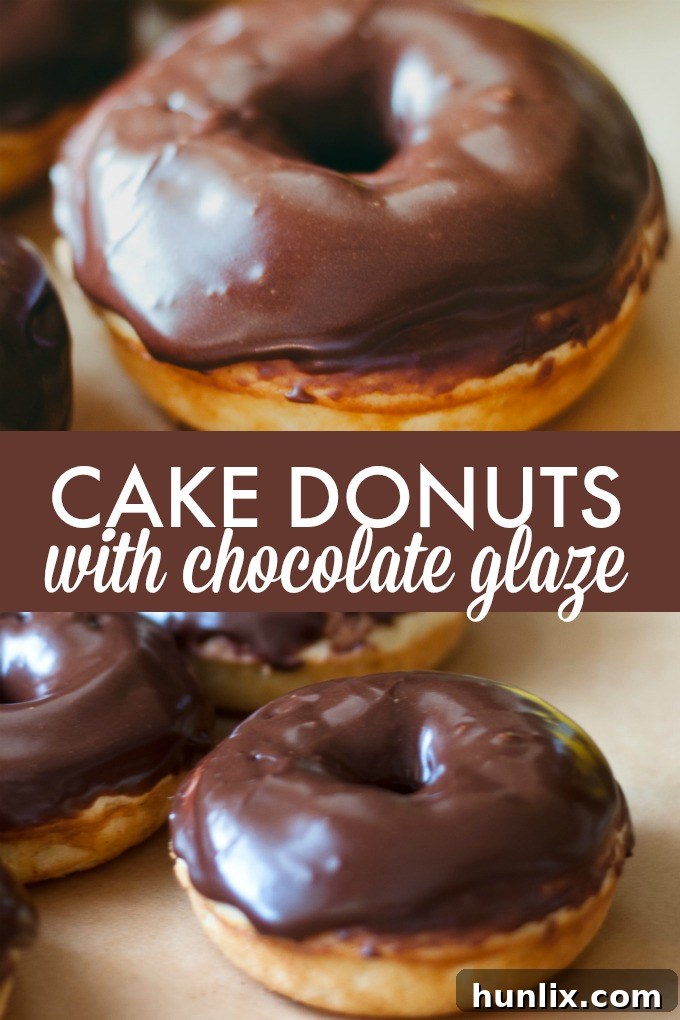 A freshly baked batch of Cake Donuts with Chocolate Glaze, arranged neatly on a platter, highlighting their perfect shape and irresistible coating.